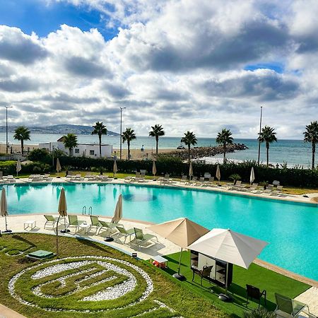 Grand Mogador Sea View & Spa Tangeri Esterno foto View of the pool at the Hotel