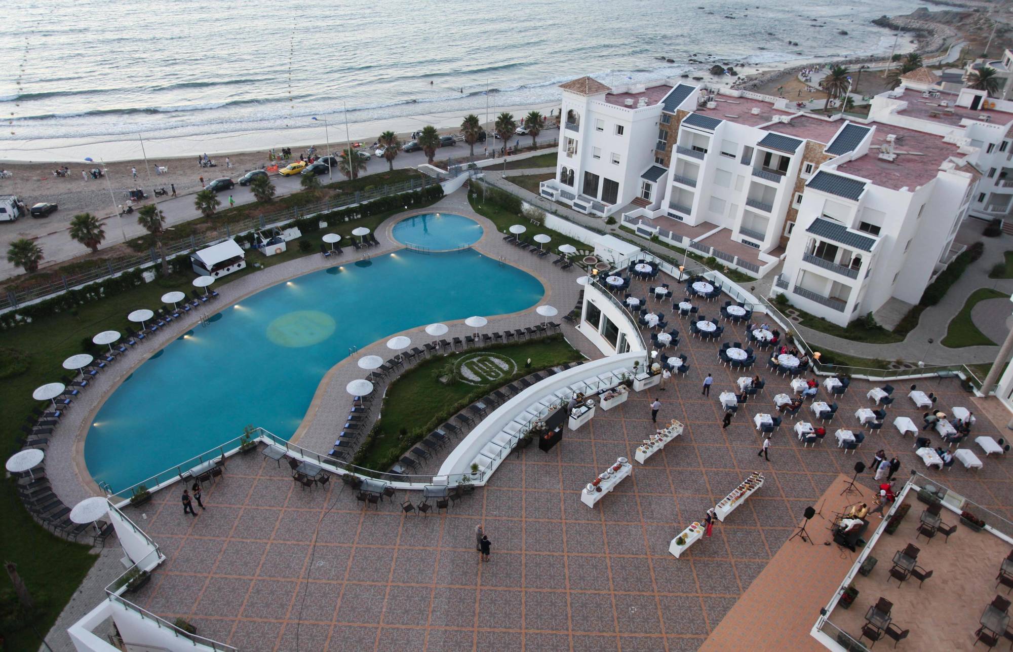 Grand Mogador Sea View & Spa Tangeri Esterno foto Aerial view of the pool at the Sheraton Vistana Resort