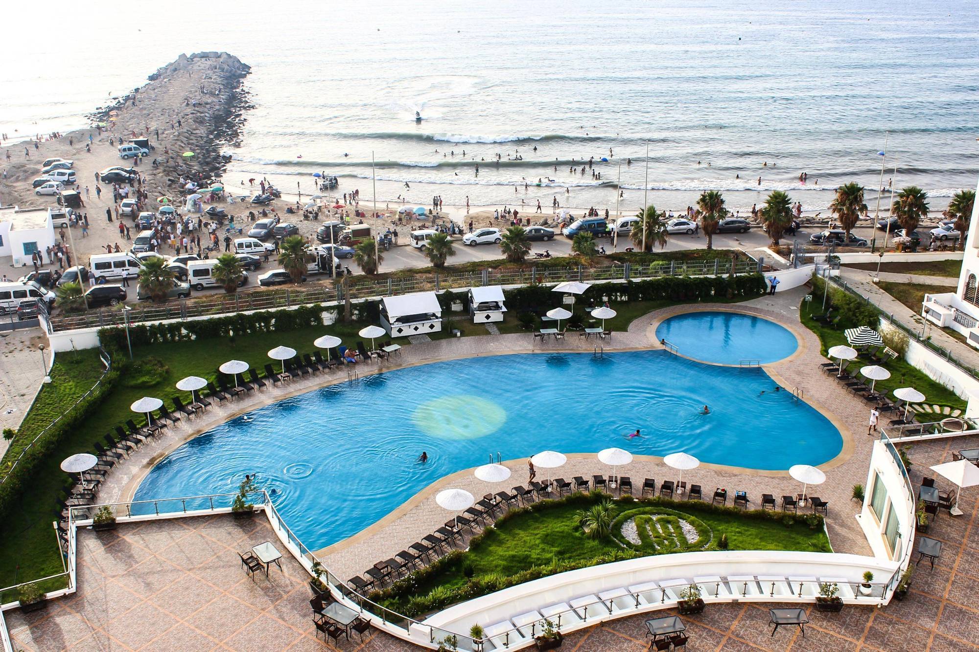 Grand Mogador Sea View & Spa Tangeri Esterno foto The pool at the Hotel del Coronado